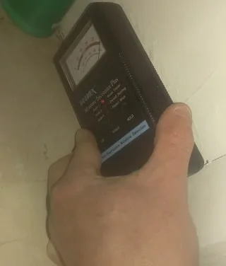 Moisture meter used during a building pest inspection